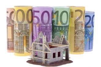 Many euro banknotes with shell house. Against a white background Austria