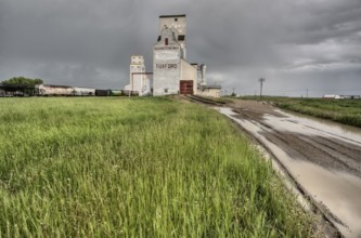 Prairie Grain Elevator in Saskatchewan Canada with storm clouds