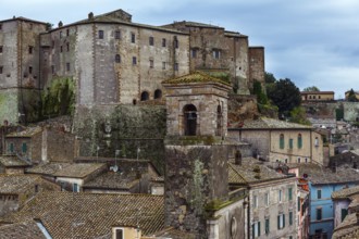 Italy, southern Tuscany. The tufa city of Sorano is a enchanted city from a fairy tale. Tiled roofs