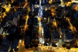Aerial drone photograph of the cityscape of Nicosia in Cyprus at night