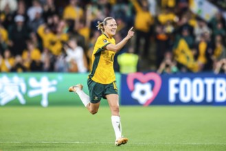 BRISBANE, AUSTRALIA, JULY 27: Emily VAN EGMOND of Australia celebrates scoring as Australia plays