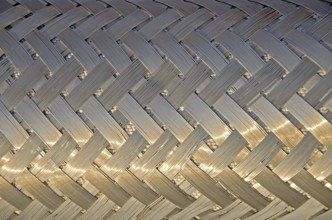 Background metal mesh in the evening sun