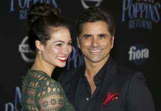 Caitlin Mchugh and John Stamos at the World premiere of Disney's 'Mary Poppins Returns' held at the