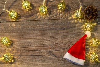 The photo shows a Christmassy, wooden background with space for text messages