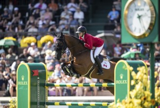 Tiffany Foster of Canada and riding Figor compete in the first round of the 1.60m CPKC