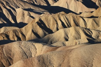 Hikers at Zabriskie Point in Death Valley National Park, California, USA, North America