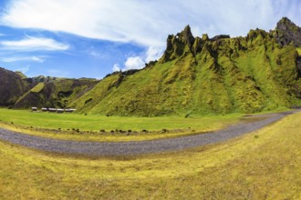 The photo was taken Fisheye lens. Camping in the canyon Pakgil, Iceland. The canyon - green grass