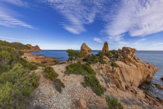 Coastal landscape with bizarre red rocks and sea view, Spiaggia di Cala E'Luas, Ogliastra,