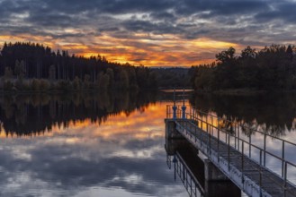 Sunset over a lake Atmospheric landscape shot from the Harz Mountains