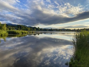 Scenic sky above the lake of Bad Bayersoien in the Bavarian Alps, Germany, Europe