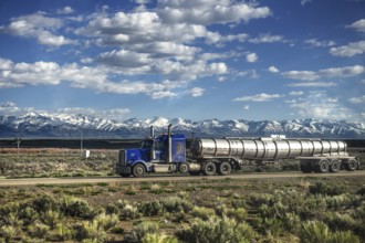 Truck on Interstate 80 in front of the Ruby Mountains, Toiyabe National Forest, Elko, Nevada, USA,