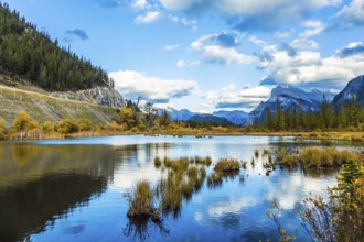 Group of lakes in the Canadian Rockies. Autumn day on the lake Vermilion. The concept of