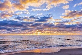 Wonderful sunrise at the beach in summer