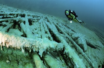 Diver in a mountain lake, Austria, Tyrol, Europe