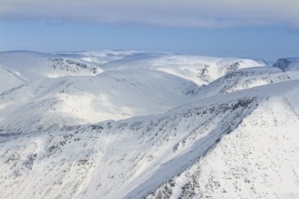 Beautiful snow-capped mountains against the blue sky