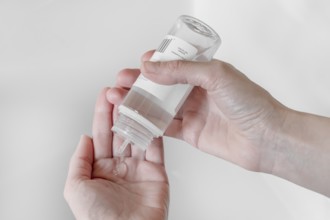 Hand sanitizer gel. Disinfecting hands. Taking disinfection alcohol gel on hands to prevent virus