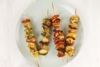 Kebab from meat and vegetable on plate, top view . BBQ food concept