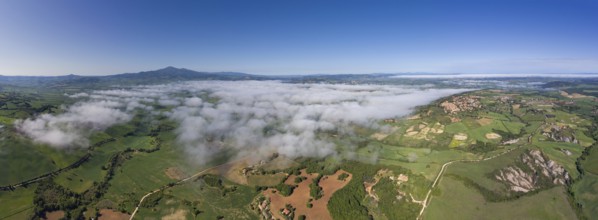 Tuscany aerial panorama landscape of farmland hill country at morning. Italy