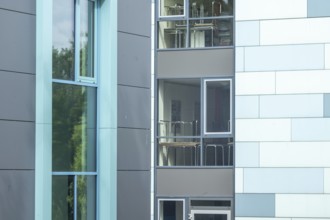 Modern office building with blue-green windows