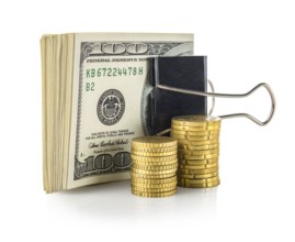 Dollars and coins isolated on a white background