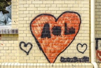 A heart sprayed on a wall as a background
