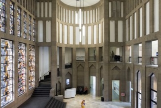 Central entrance hall with staircase and Jan Thorn-Prikkers leaded glass window mural