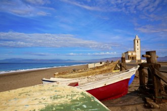 Cabo de Gata in Almeria at San Miguel Beach and Salinas church with stranded boats