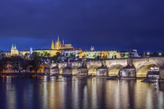 The castle, the cathedral and the famous Charles Bridge in Prague by night