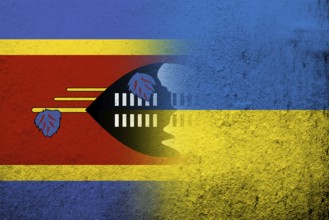The Kingdom of Eswatini Swaziland National flag with National flag of Ukraine. Grunge background