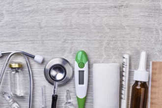 Medical instruments on wooden background. Opening of a pharmacy