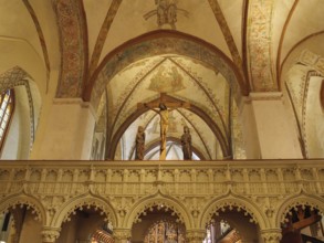 Church interior with an ornate altar and Christian figures under ornate frescoes and arches, holm,