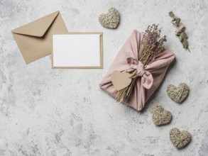 Zero waste Valentine's Day concept and mock up. Eco-friendly gift cloth wrapping in Furoshiki