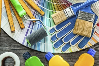 Composition of paint equipment on wooden board