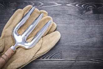 Stainless trowel fork leather safety gloves agriculture concept