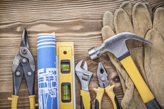 Construction level plan safety gloves claw hammer gripping tongs steel cutter adjustable wrench on