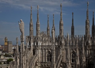West side of the north transept, upper part with 19th-century pinnacles bearing lashings and