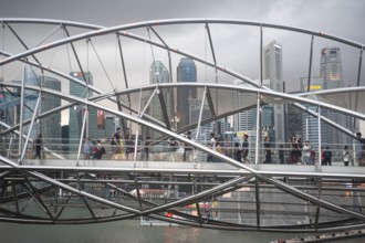 26.01.2020, Singapore, Republic of Singapore, Asia, People crossing the spiral helix bridge in