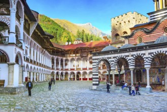 Rila, Bulgaria, October 27, 2017: Rila monastery view with autumn mountain trees at background,