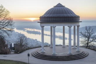 Beautiful temple in a landscape shot. Sunrise on a winter morning. Beautiful view along the Rhine