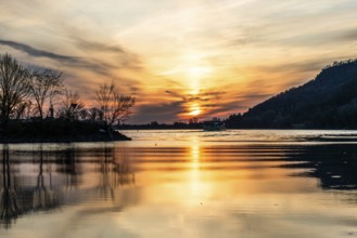 Morning atmosphere on the river, cruise ship on the Danube, near Rossatz, golden hour at sunrise,