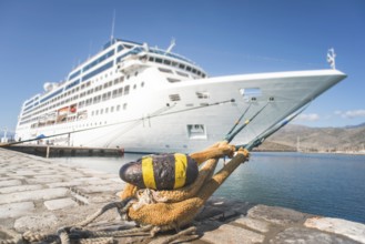 Big white cruise ship. Synny day. Greece