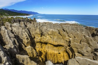 Pancakes Rock is a natural wonder of New Zealand. Paparoa Park. Stone flat pancakes, stacked on top