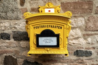 Historic yellow May box in an old town in Germany