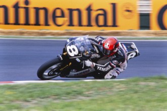 The German Jochen Schmid on the race track on Yamaha 250 cc, German Mitsui-Yamaha Team, Motorcycle