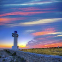 Barbaria Berberia Cape Lighthouse Formentera at sunset in Balearic Islands
