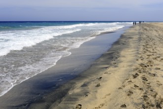 Footprints in the sand, black beach, Jandia, Playa del Matorral, Jandia Peninsula, Fuerteventura,