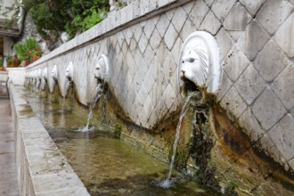 The lion fountain in the village of Spili on Crete, Greece, Europe
