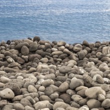 Volcanic rock beach and sea- ideal for backgrounds