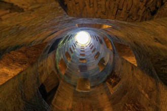 Orvieto, Italy, 18 November, 2023: view looking up from St. Patrick's Well in downtown Orvieto,