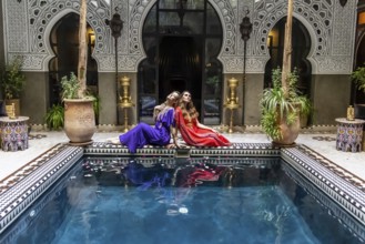 A gorgeous model poses inside a home environment in Medina, Morocco, Africa